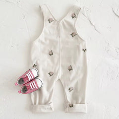 Embroidered floral baby overalls in soft cream corduroy back view