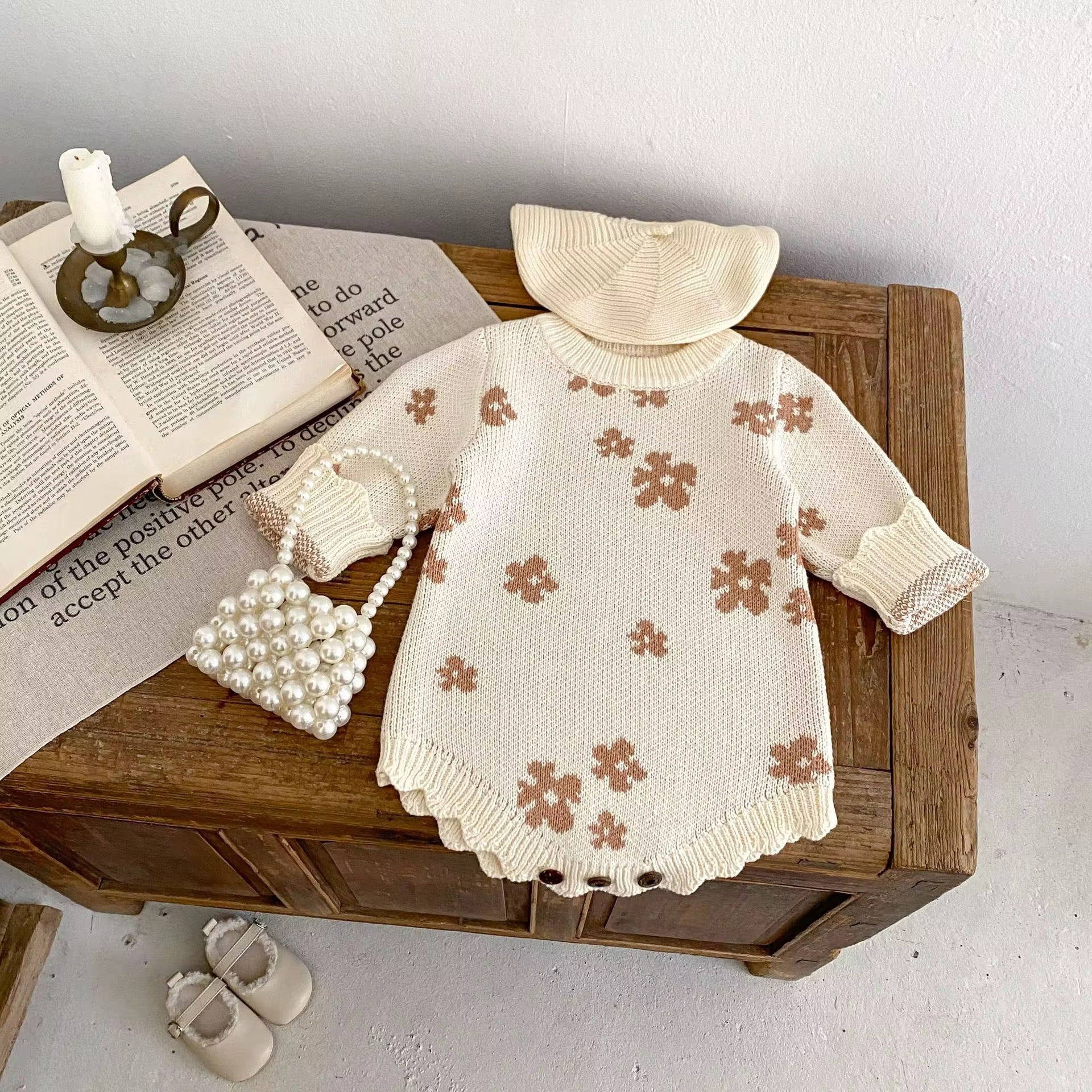 Cozy floral knit baby onesie cream long sleeve