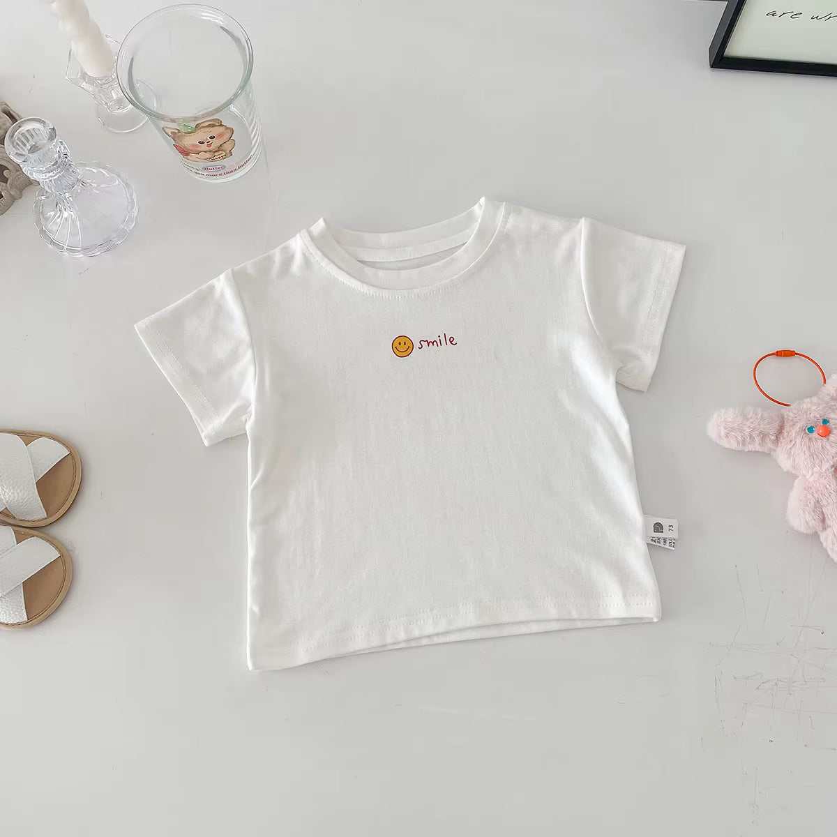 White stretch baby t-shirt for toddlers 12 to 36 months